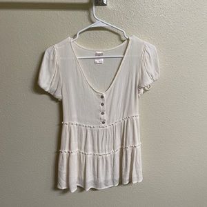 Cream blouse with buttons